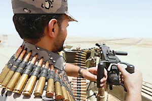 File photo of Saudi border guard manning machine gun at Saudi Arabia's northern borderline with Iraq