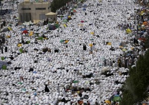 Muslim pilgrims perform prayers in Arafat during the annual haj pilgrimage, outside the holy city of Mecca