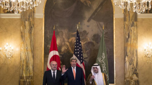Turkish Foreign Minister Sinirlioglu, U.S. Secretary of State Kerry and Saudi Arabia's Foreign Minister al-Jubeir pose for a photo during a photo opportunity in Vienna